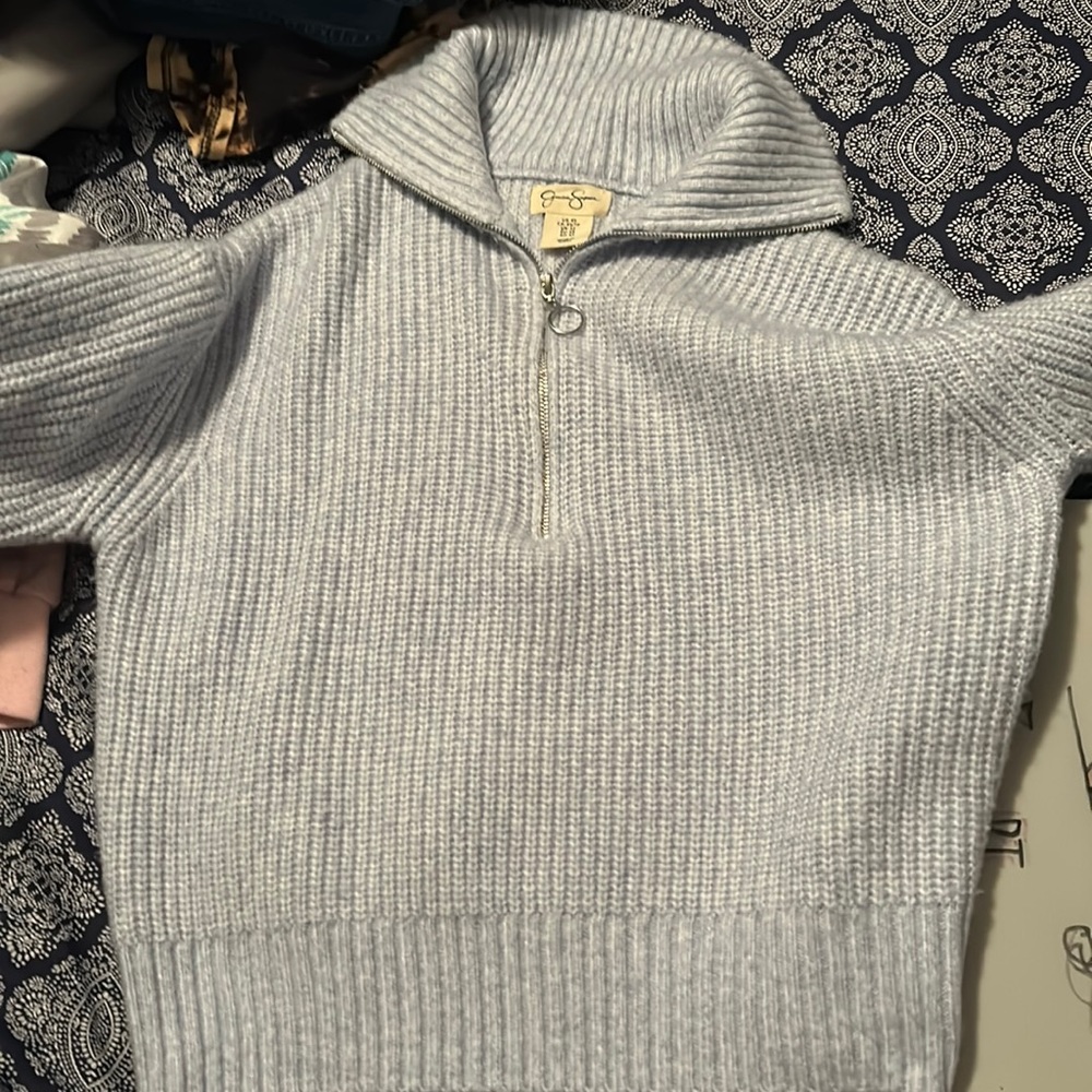 light blue half zip up sweater